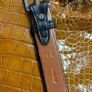 One black cow belt. Sise 35”. 1 1/4” w.